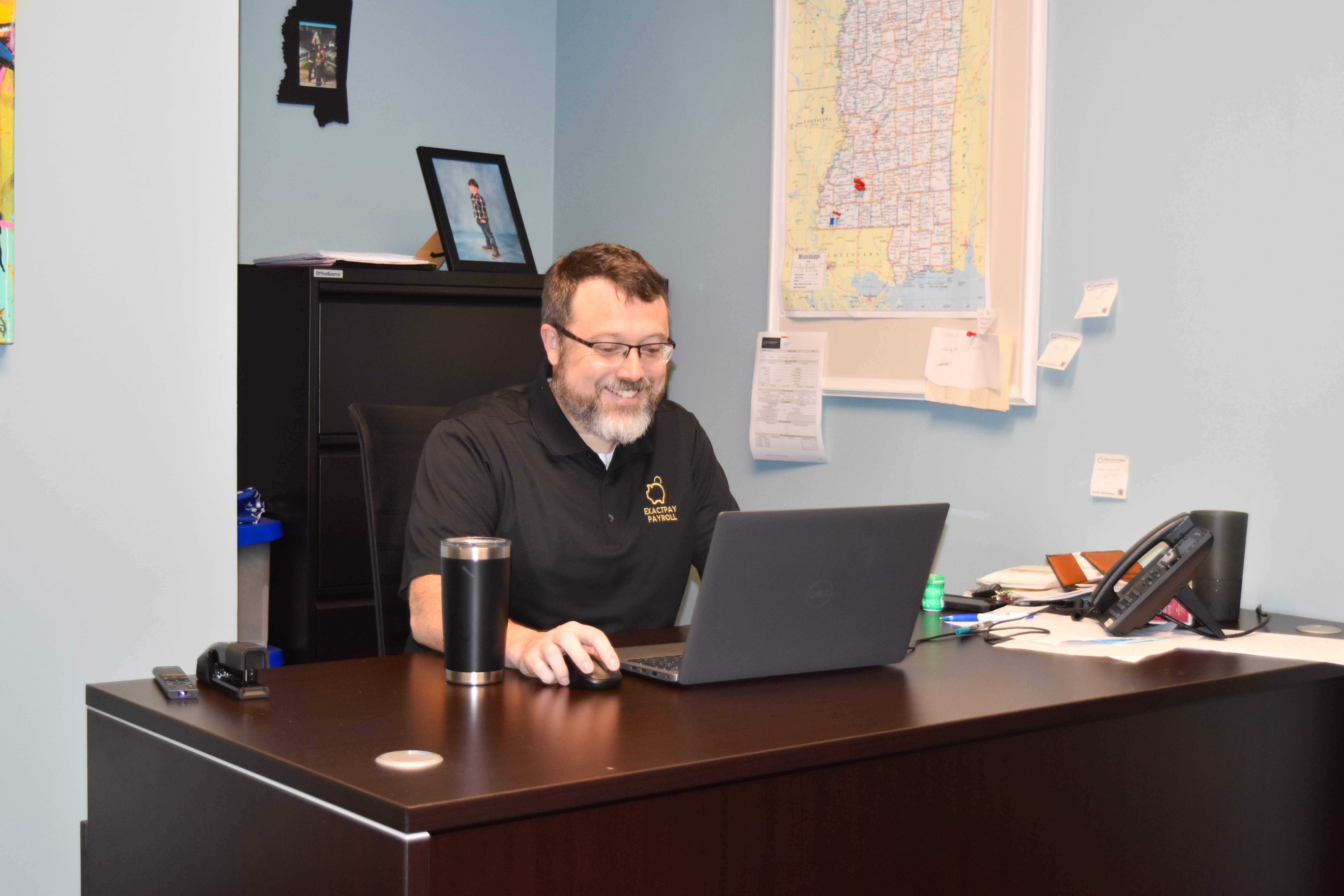 Exactpay team member at work